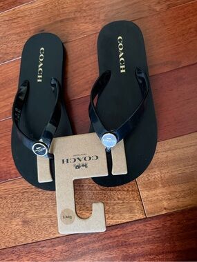 Coach Black Flip Flop Sandals with Gold Logo Accents